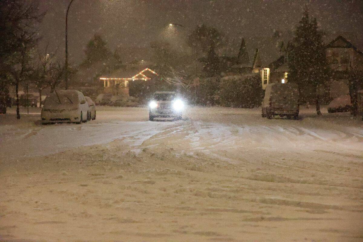 A vehicle driving slowly down a side street in Langley on Tuesday, Nov. 29, 2022. (Photo: Anna Burns)