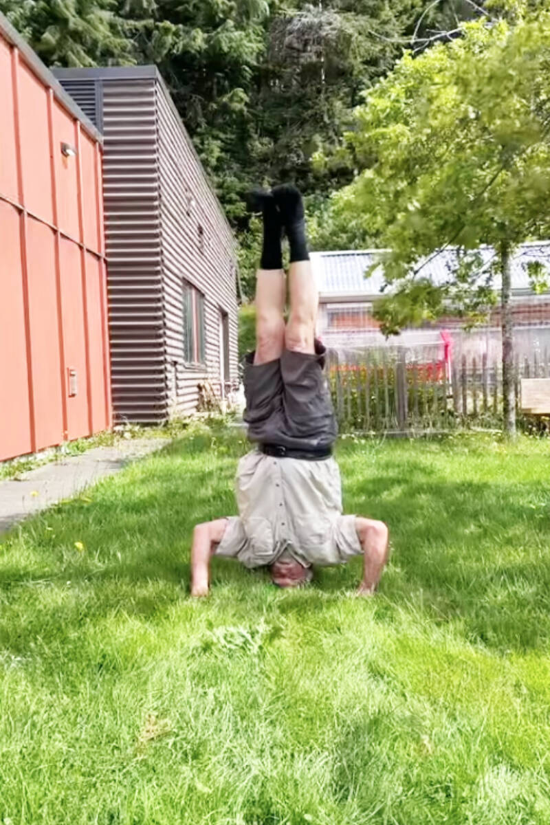 At 82, Bruce Ives from Daajing Giids broke the Guinness World Record as the oldest male to perform a headstand. (Photo: Megan Romas Facebook)