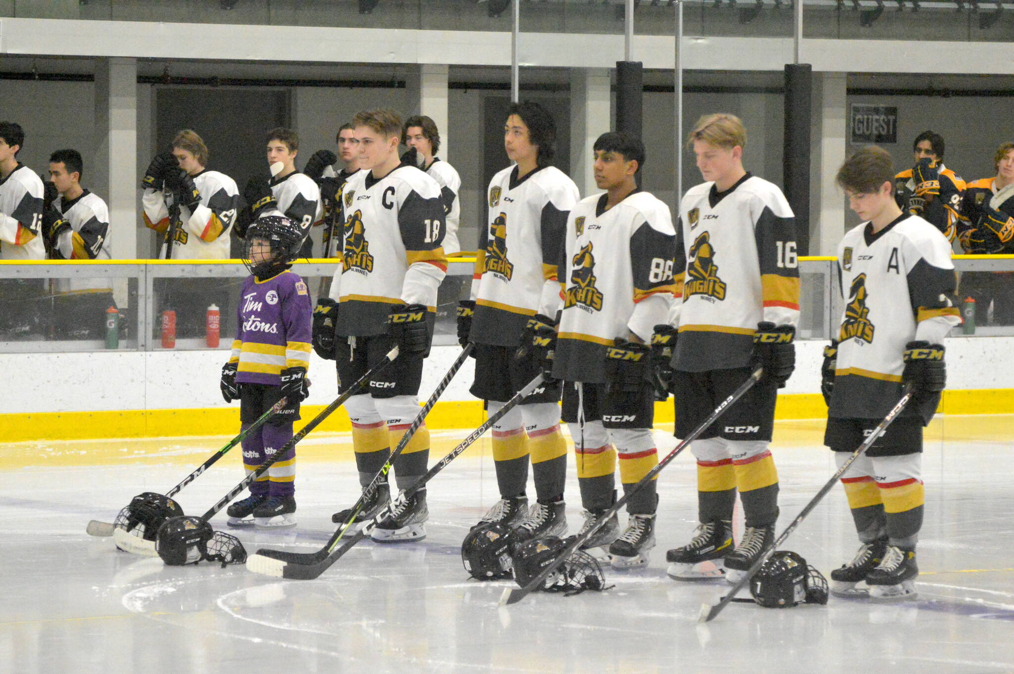 Surrey Knights players stand for "O Canada" during a game against Delta Ice Hawks at North Surrey Sport & Ice Complex on Thursday, Feb. 9, 2023. (Photo: Tom Zillich)