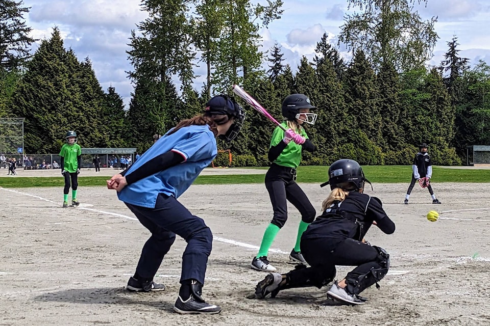 The South Surrey White Rock Minor Softball Association (SSWRMSA) hosted its May Madness tournament at Sunnyside Park for U11 players over the weekend (May 6 and 7). Here, Lime Drivers player Olivia Brucki is at bat. (Tracy Bell photo)