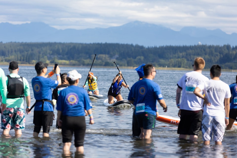 The Champion of the Crescent, an annual Surrey Hospitals Foundation paddleboard event in support of youth mental health programs, has raised more than $265,000, which was announced at the fundraiser on Saturday (July 22) in Crescent Beach. (Anna Burns photo)