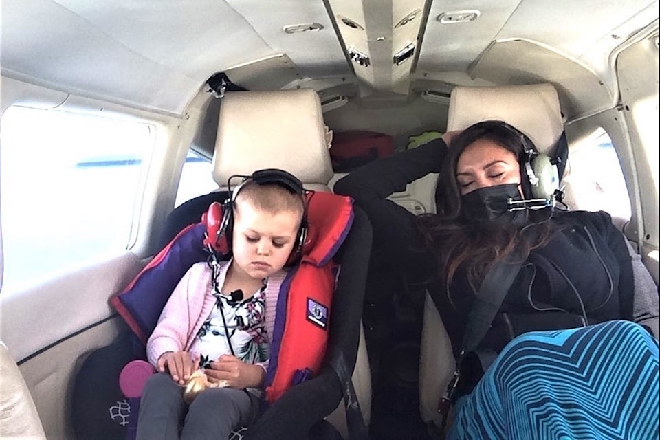 Mom Amaeya and Marea on an Angel Flight.