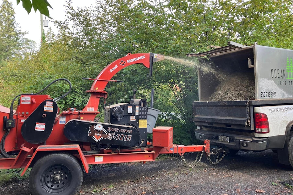Central Saanich Fire Department helps rural residents on Alec, West Saanich and Mt. Newton Cross roads chip yard waste on site, Sunday, Oct. 5.
