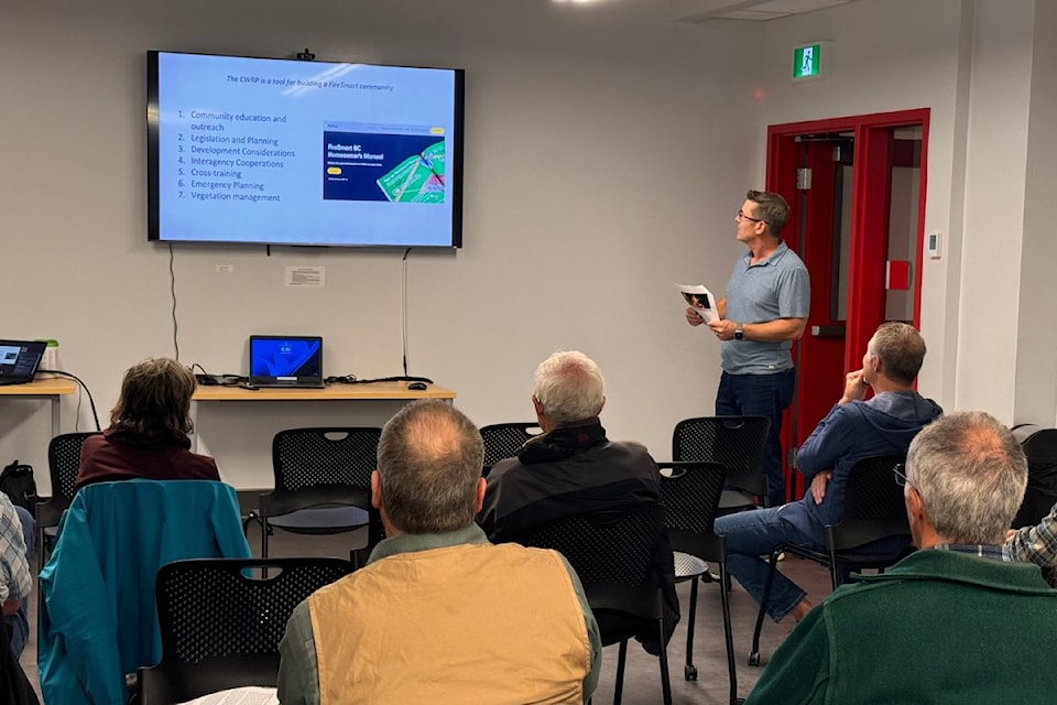 Diamond Head forester Mike Coutlhard gives residents updates on Sidney's Community Wildfire Resiliency Plan in an open house on Oct. 16.
