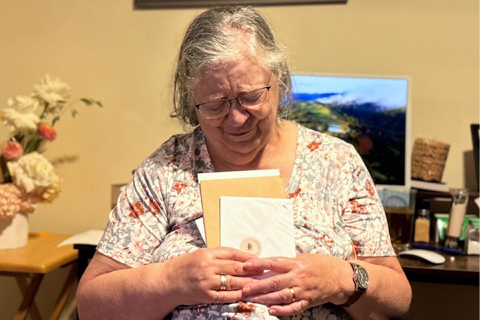 Elaine Sinclair gets emotional after reading the cards sent by strangers.