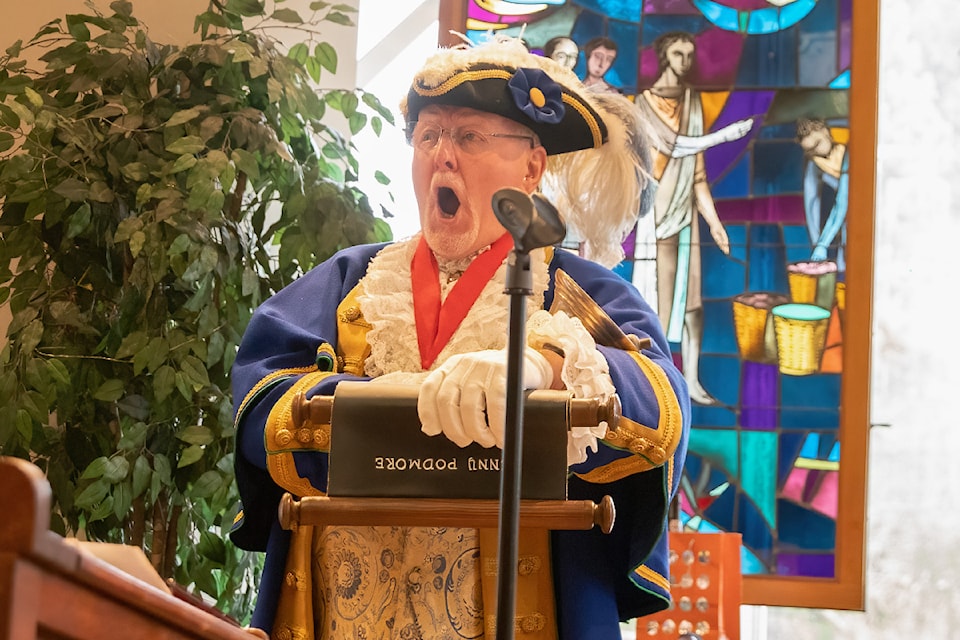 Kenny Podmore makes one final proclamation during his official retirement party as Sidney Town Crier Jan. 23. 