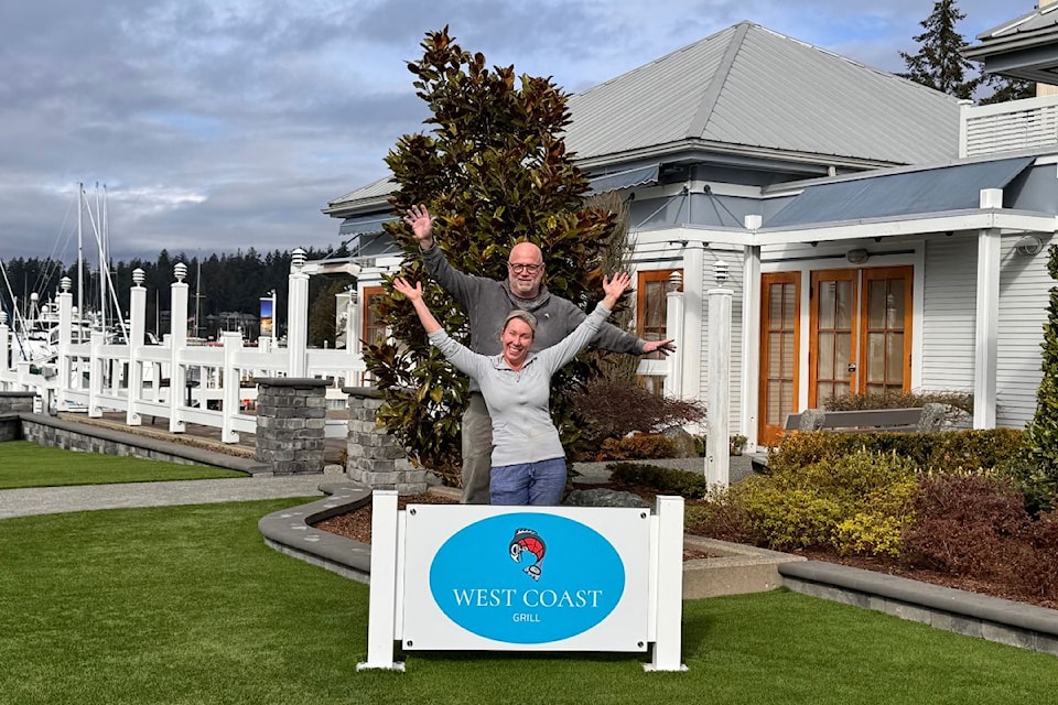 Restaurateur Valerie Lessard and Paul Wallace in front of West Coast Grill which is slated to open on April 15.