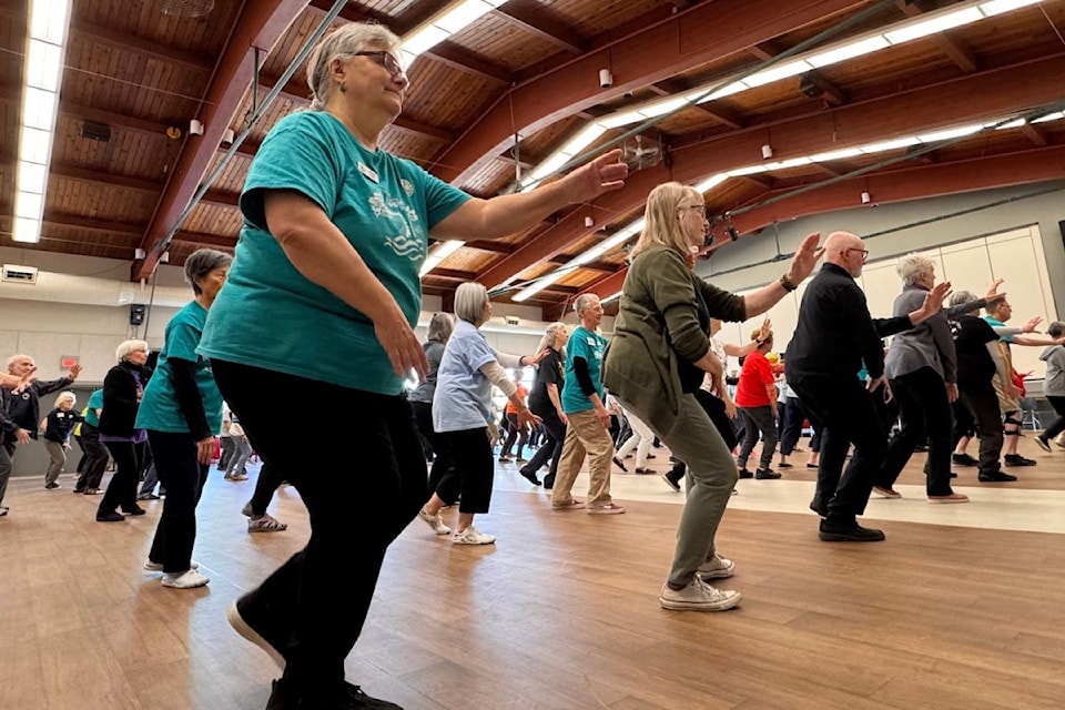 Members celebrate 50 years in Victoria with tai chi workshops and talks.