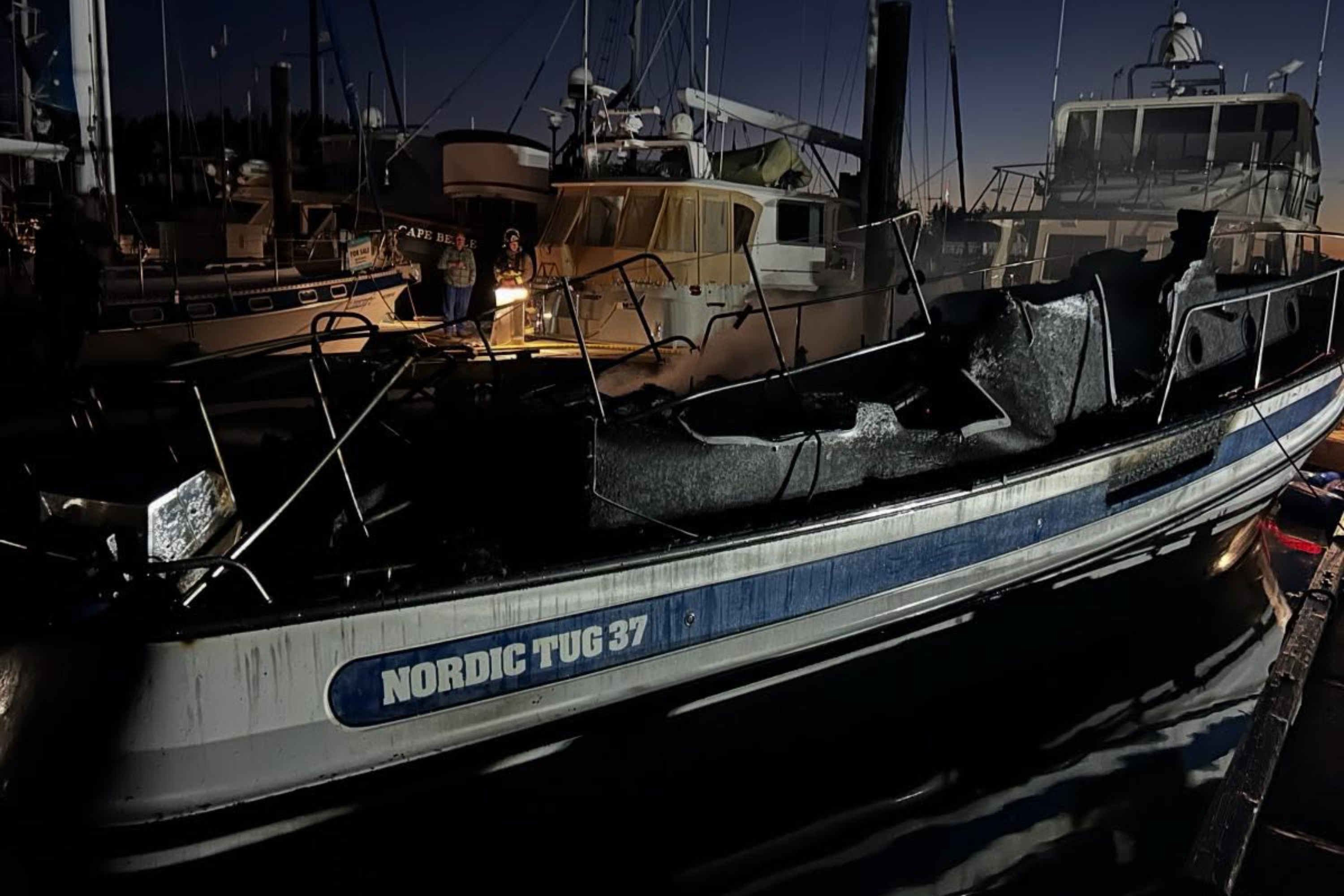 Early morning Island marina fire destroys 1 boat, damages 2 others