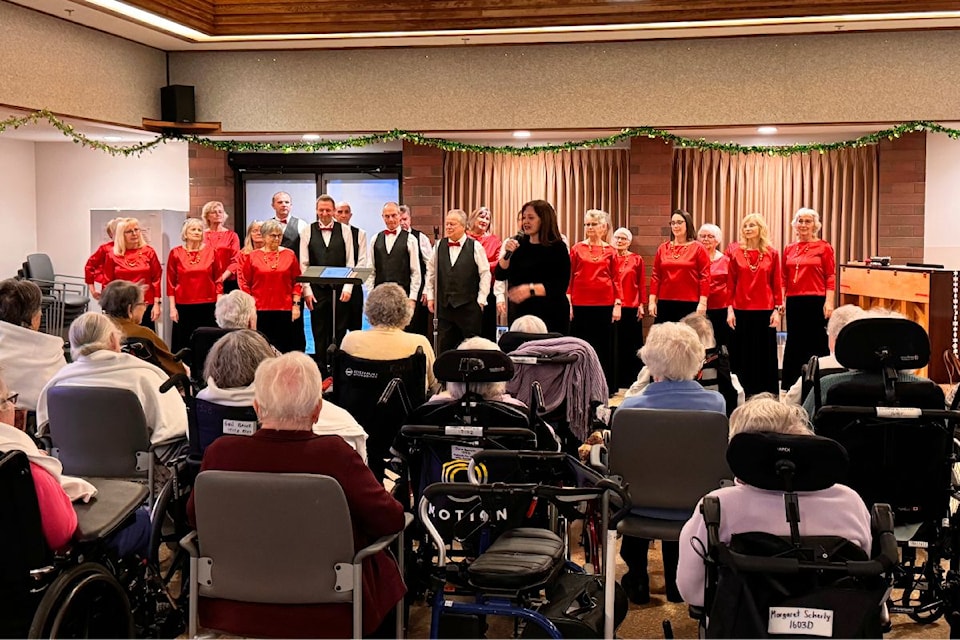 The Peninsula Singers serenading residents of the extended care unit at Saanich Hospital.