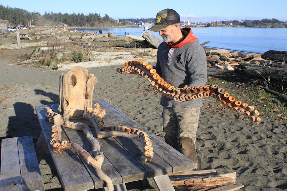 Paul Lewis is pictured here working on a new piece, an octopus, on Jan. 21 at the Colwood waterfront.