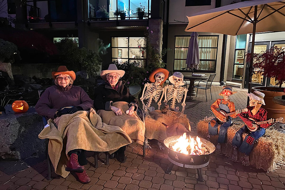 Residents of Berwick House join some boney friends outside the Shelbourne Street retirement community. The residence is hosting its fifth annual Great Pumpkin Walk. (Photo courtesy Berwick House)