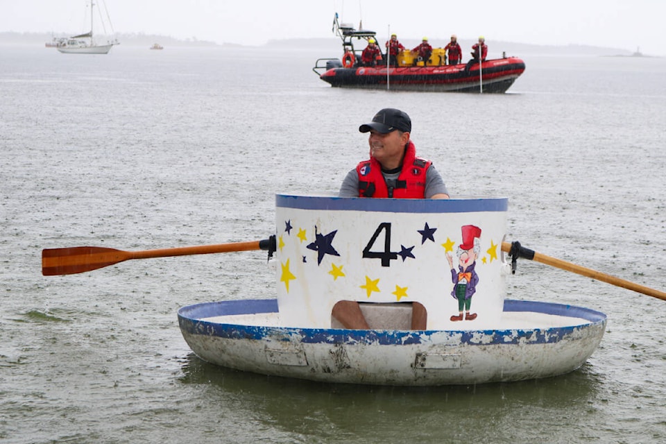 Oak Bay Mayor Kevin Murdoch competes in the Oak Bay Tea Party teacup race on June 5, 2022. (Bailey Moreton/News Staff)