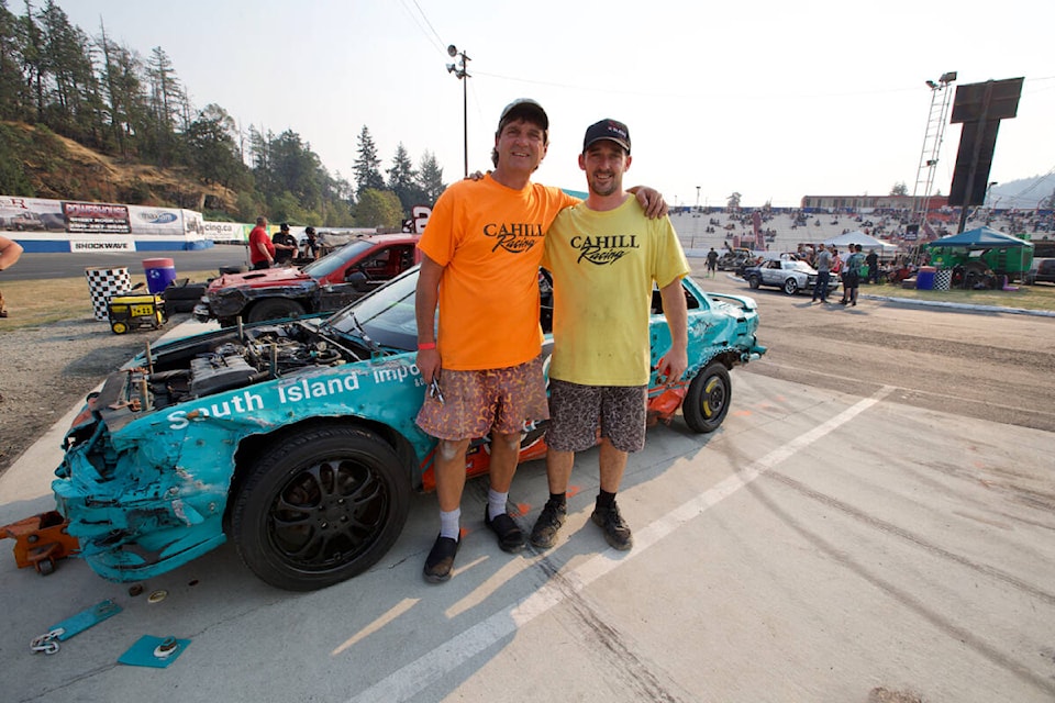 Celebrating the Western Speedway and Westshore Motorsports Park feature, page B1. Keith and Daryn Cahill stand for a photo in front of their car Saturday (Sept. 10) ahead of the Demo Championship at Westshore Motorsports Park in Langford. (Justin Samanski-Langille/News Staff)