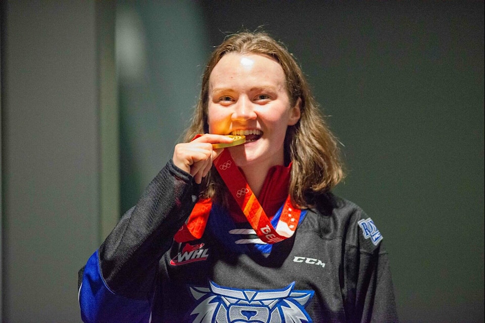 The Victoria Royals honoured Saanichton’s Micah Zandee-Hart, who was in attendance showing off her gold medal from Beijing. Zandee-Hart is the first B.C.-born player to hit the ice for Canada’s women’s hockey team at a Winter Olympics. (Simon Fearn/Black Press Media)