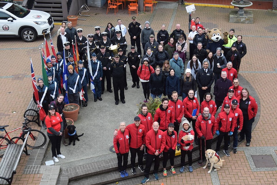 A large group gathers at Market Square in Victoria on the final day of the 2023 Wounded Warrior Run BC on Sunday (March 5). (Brendan Mayer/Black Press Media Staff)