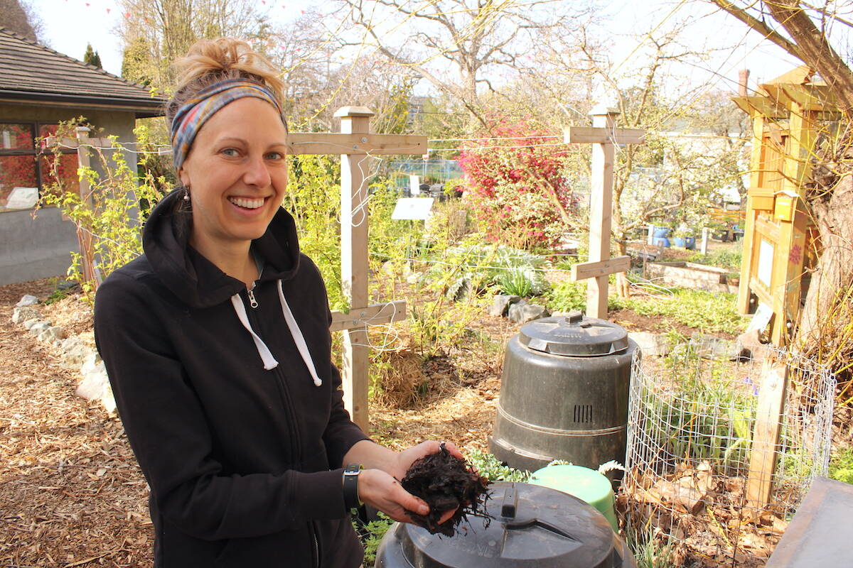 The Compost Education Centres Kayla Siefried holds some of the nutrient and microbe-packed compost created at the Victoria non-profit. (Jake Romphf/News Staff)