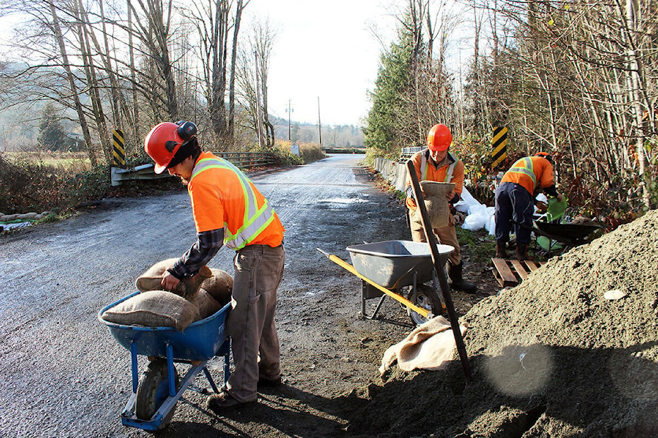 32421957_web1_230413-CPW-LJI-BC-ClimateDisaster-Halalt-sandbags_1