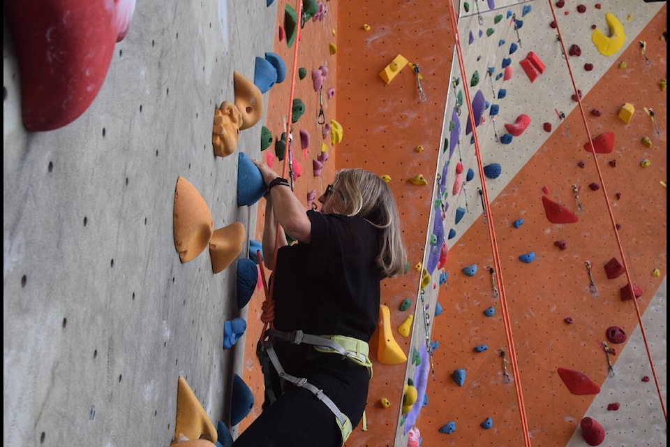 B.C. Minister of Tourism, Arts, Culture and Sport Lana Popham climbs at Boulders Climbing Gym. (Brendan Mayer/News Staff)