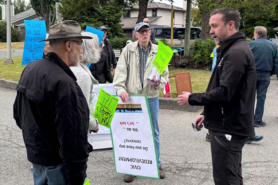 A tense moment between Mayor Ryan Windsor and some protesters.
