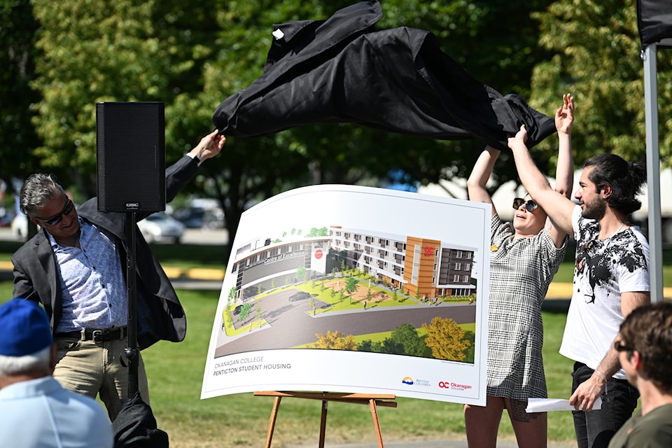 From left to right, MLA Roly Russel, Okanagan College alumni and 100 More Homes representative Annika Kim and current OC student Metin Huseyinglu unveil the new student housing project for Penticton