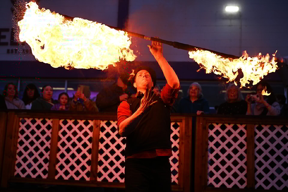 Ignite the Arts' "Parade For No Reason" featured fire spinners on Friday, March 28, 2025, in downtown Penticton.