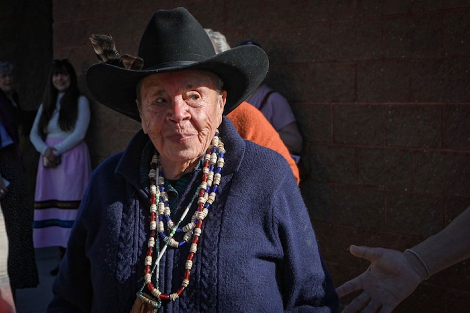 qʷʕayxnmitkʷ xʷəstalk̓iyaʔ (Jane Stelkia) of the Osoyoos Indian Band, stands outside of Nkѻýmip Campgroundѻýs Clubhouse in sw̓iw̓s (Osoyoos) in syilx territory ahead of her 95th birthday party on April 11. 