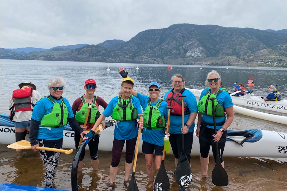 The Vernon Paddling Centre women's team celebrates after completing the 15-kilometre race at Duel in the Desert in Penticton on May 10, 2025.