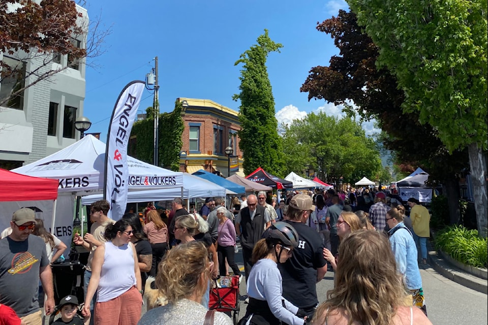 Market-goers converge on Penticton's historic Front Street for the Downtown Community Market on May 17, 2025.