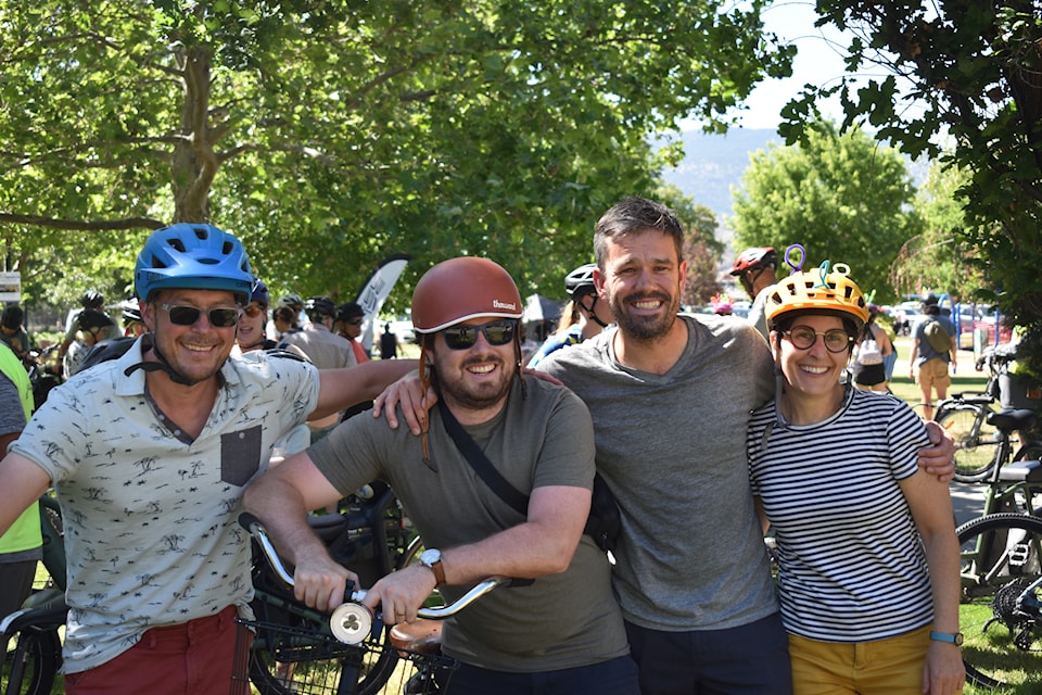 Penticton Coun. Isaac Gilbert (second from left) celebrates the opening of the lake-to-lake bike lane at Skaha Lake Park on June 7, 2025, alongside members of the Penticton Area Cycling Association. 