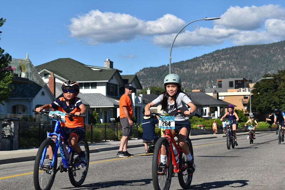 Youth cyclists compete in the 2025 "Piccolofondo" during Okanagan Granfondo weekend along  Penticton's Lakeshore Drive on July 12, 2025.
