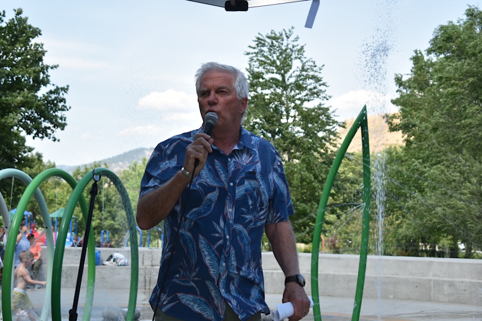 Penticton Mayor Julius Bloomfield speaks at a ceremony for the new-look splash pad at Skaha Lake Park on July 16, 2025.