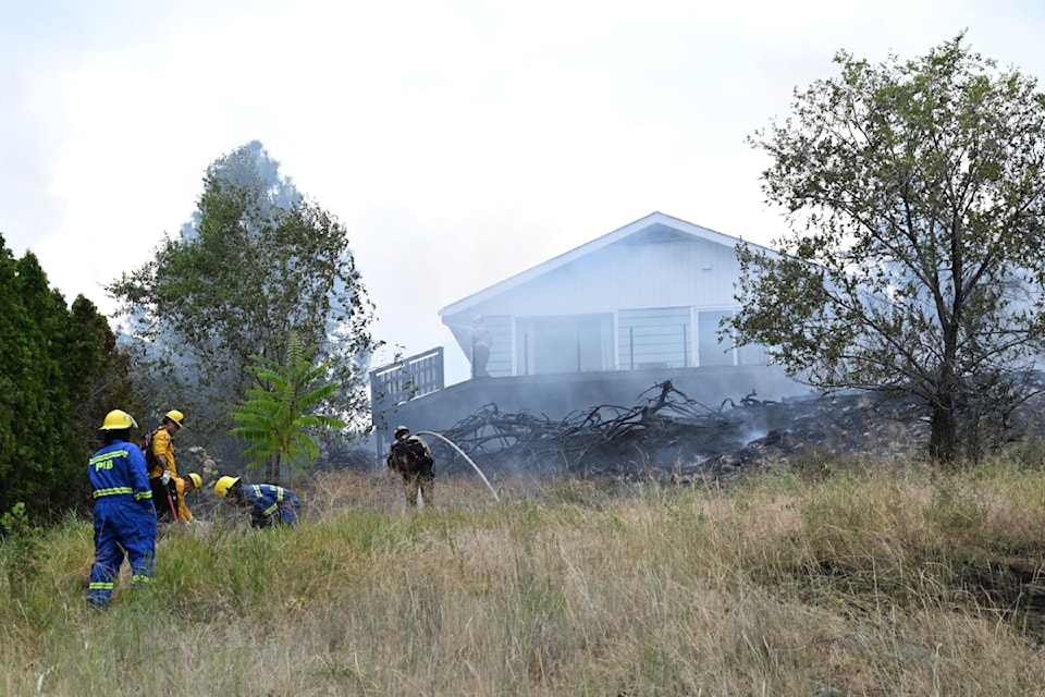 A brush fire sparked in the area of West Bench near Penticton on July 25. 