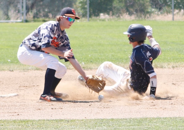 Tigers #4 couldn't reach the ball in time to tag out Tri City's Thomas Connell.