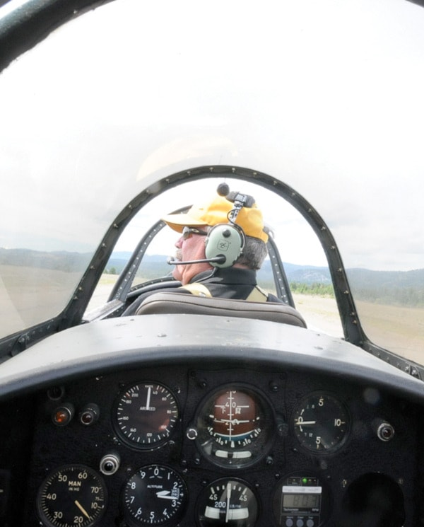 Pilot Paul Dumoret checks for traffic