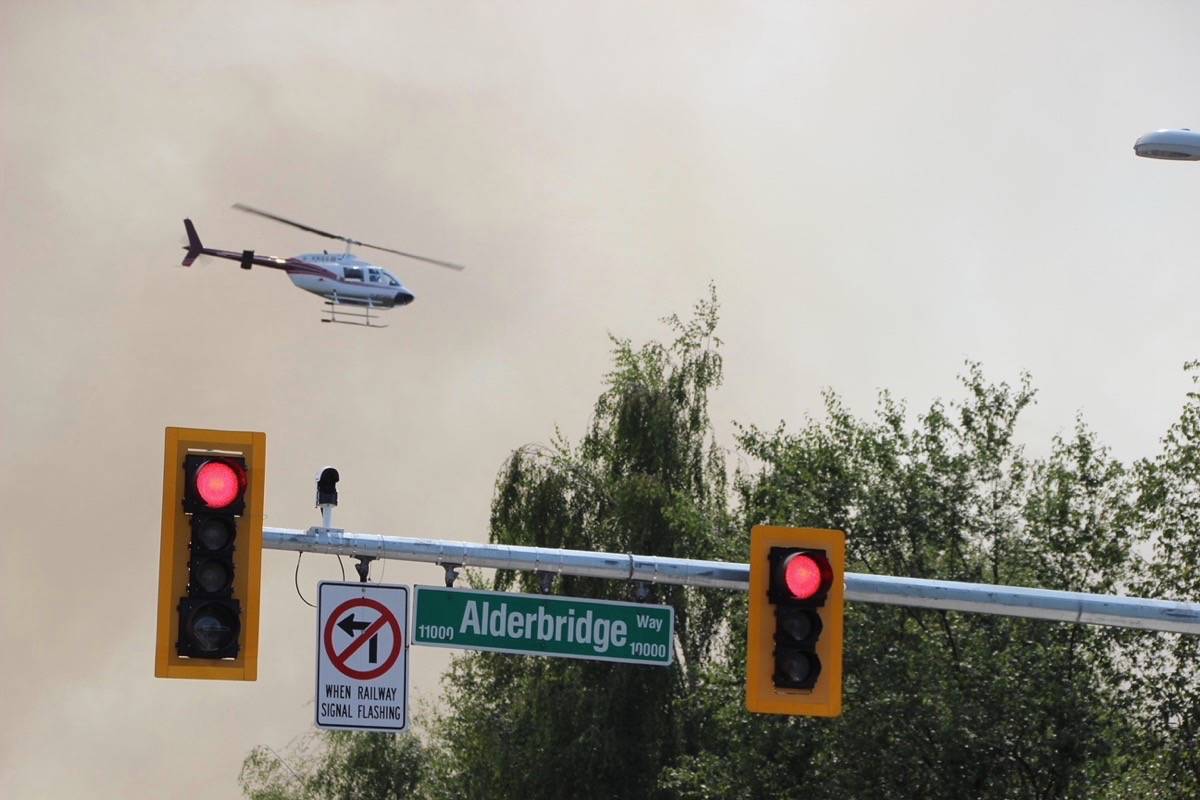 12904967_web1_180727-BPD-M-Richmond-bog-fire8