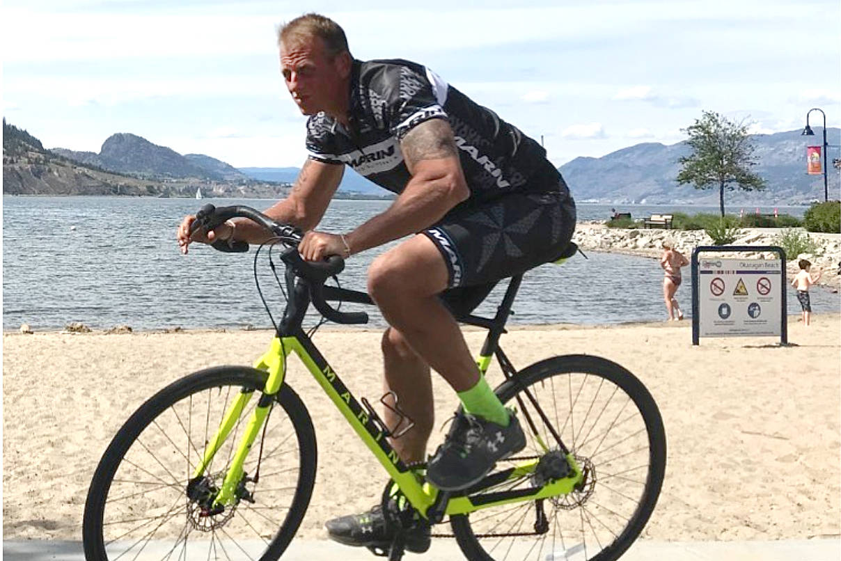 Guy biking on sale