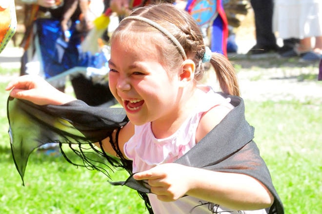There were plenty of smiles among the young dancers at the National indigenous People’s Day celebration last Friday outside of the Shatford Centre. (Kristi Patton — Western News)