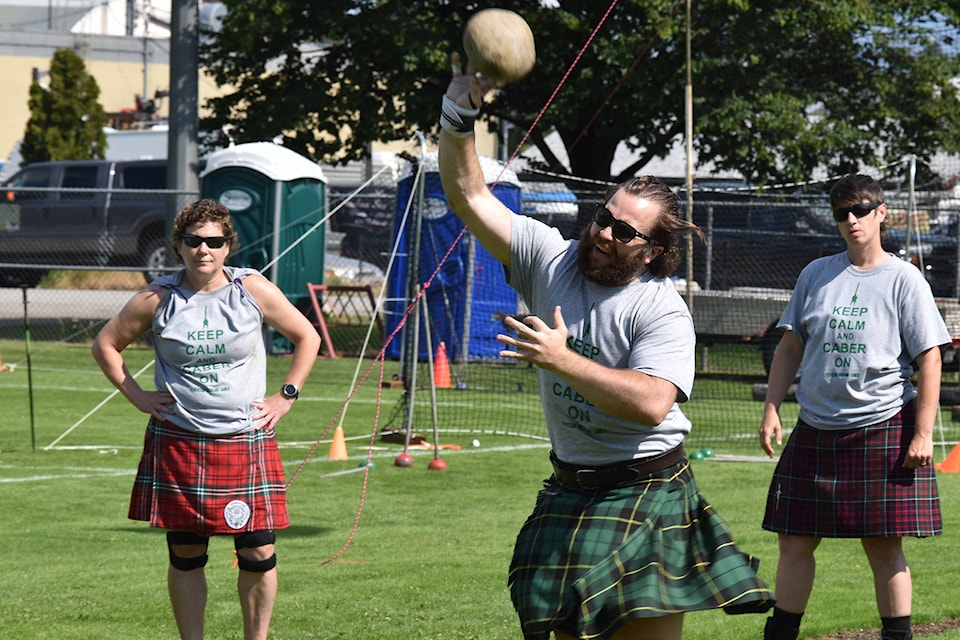 Justin Wallace throwing the stone in the heavy events at the Penticton Scottish Festival. (Brennan Phillips - Western News)