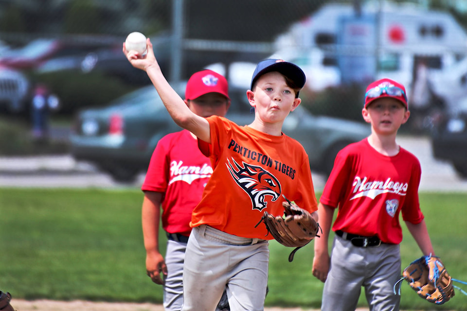 Sam Mullins with the Penticton Tigers in the Tadpole division throws a strike during the skills competition on July 13.