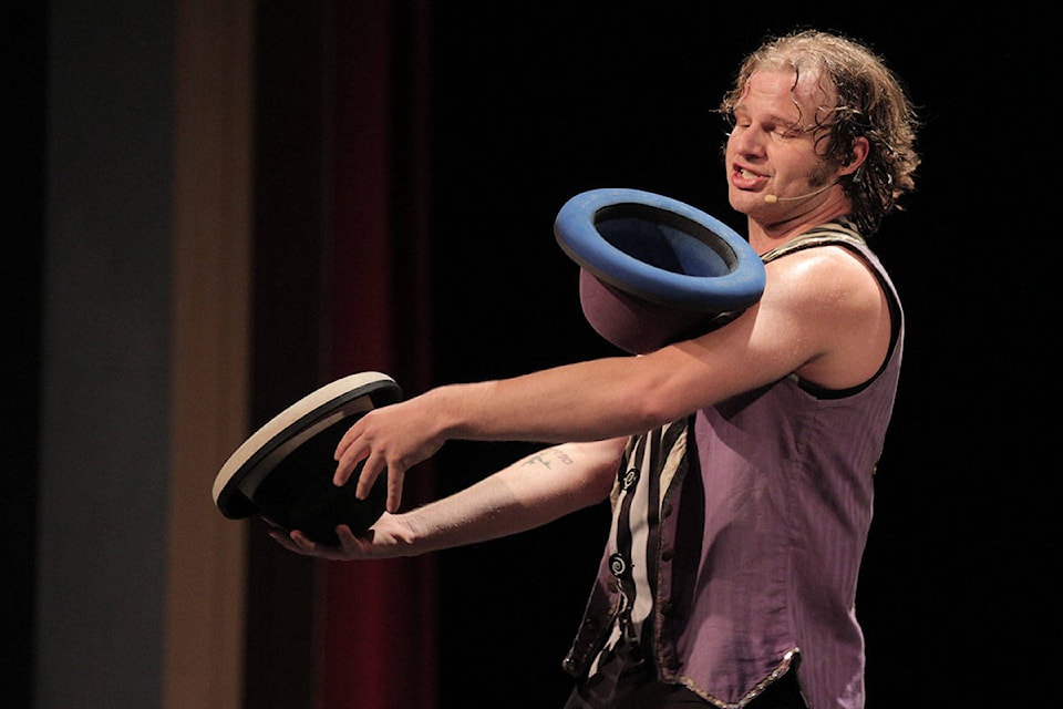 Hat juggling thrilled the audience of small children. (Robin Grant/Western News)