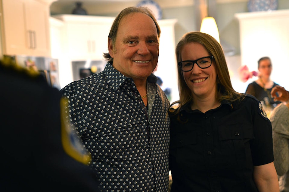 Steven St. Germain pictured with Michelle Foley, the dispatcher who helped neighbours and family keep St. Germain alive until first responders arrived. Phil McLachlan - Penticton Western News