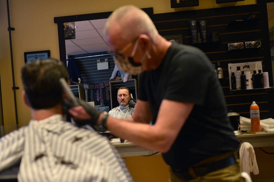 Jesse Malott is one of many relieved to get a haircut after nearly two months of barbershops being closed due to COVID-19. (Phil McLachlan - Western News)