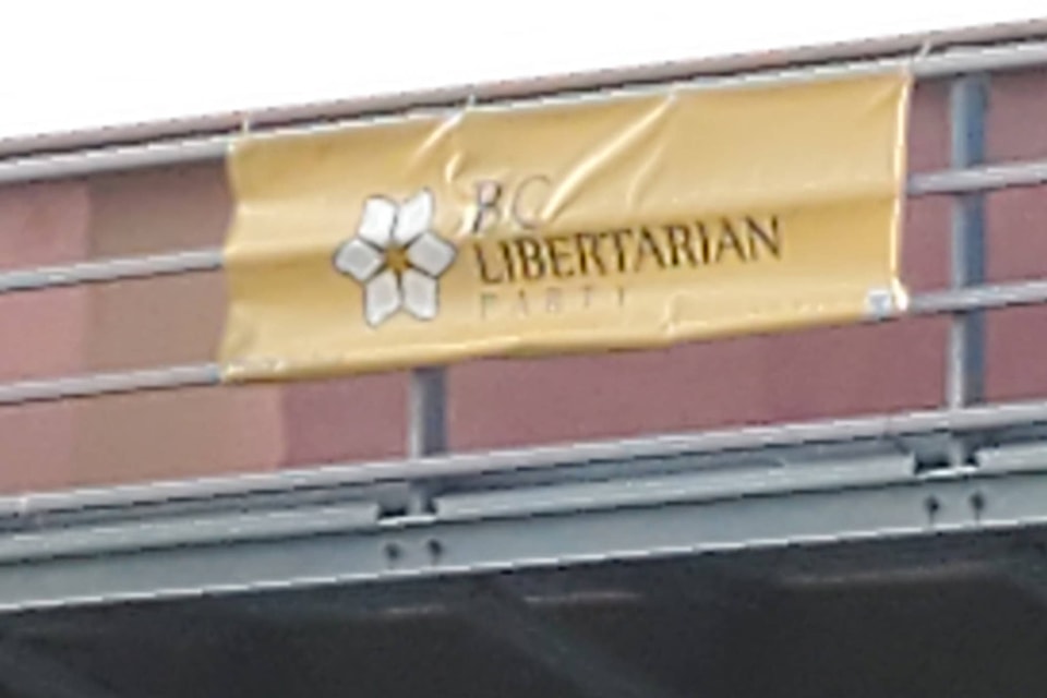 23266886_web1_201111-PWN-BannerStolen-libertarian_2