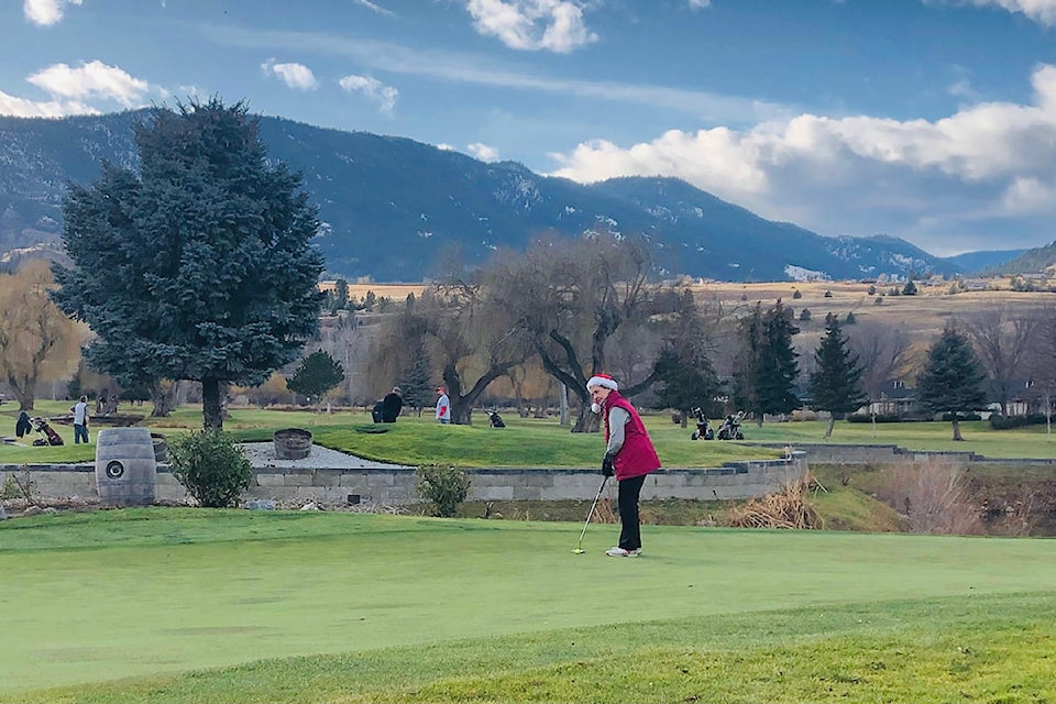 Ellsy Mackie gets some putting practice in before her tee time at Penticton Golf Course on the last day of fall, Dec. 20. At 13 degrees Celsius temperatures, it was a great day to end the golf season. (Monique Tamminga / Western News)