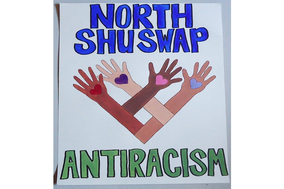 24255673_web1_210219-SAA-anti-racism-signs_1