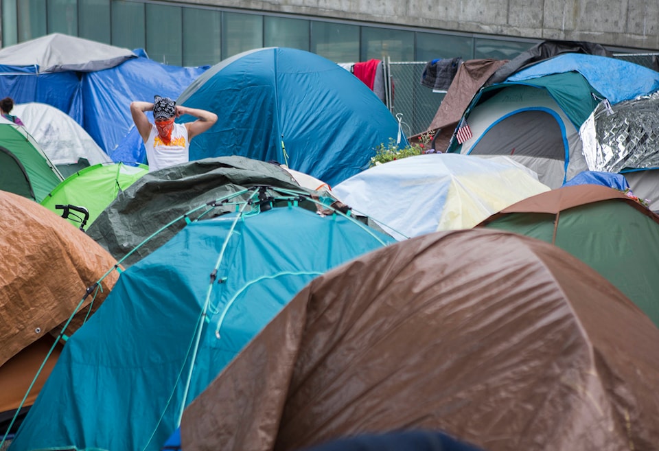 24408850_web1_210310-PWN-EbyShelter-homelesscamp_1