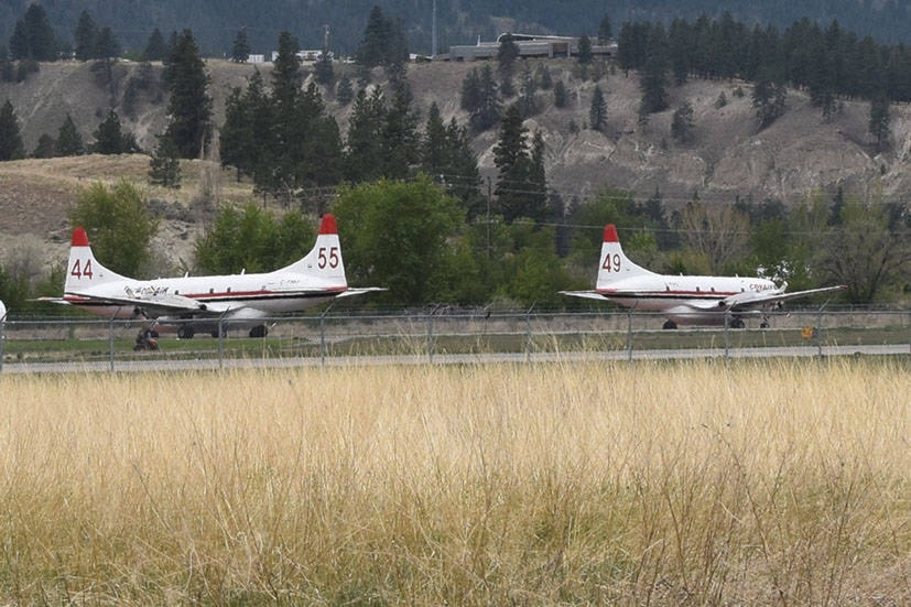 The pilots landed the three air tankers and one bird dog at the Penticton airport base on Saturday. Penticton will be their base until at least Aug. 31. (Monique Tamminga Western News)