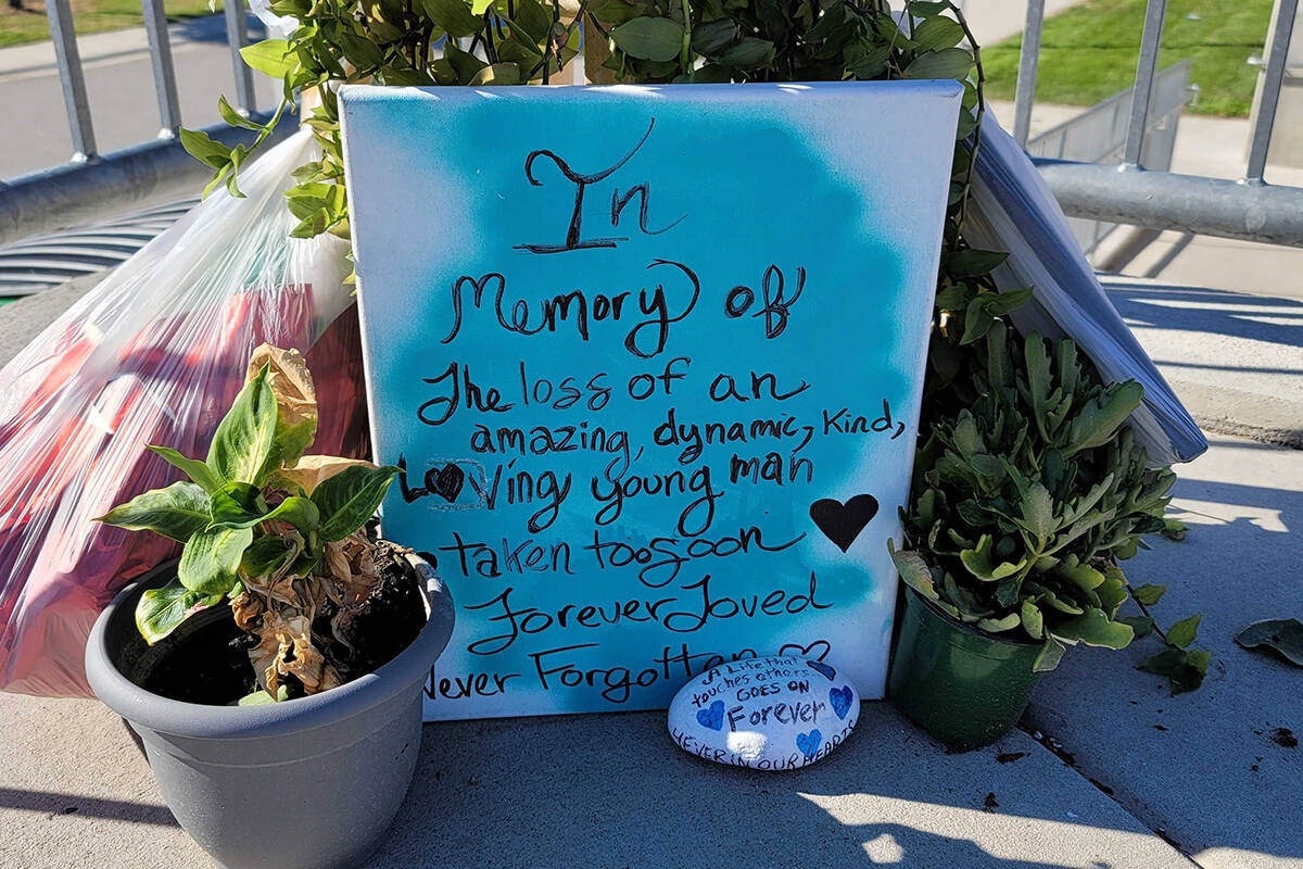 A memorial to honour murder victim Taig Savage stands outside Pen High Monday. (Clayton Whitelaw Western News)
