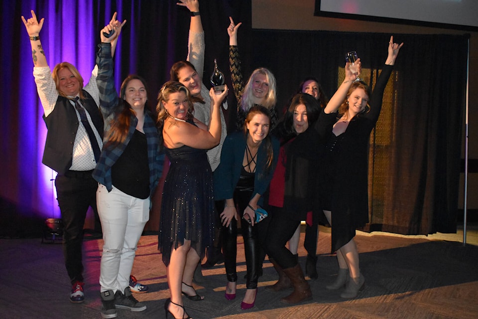 Total Restoration celebrates winning 2021 Best Business of the Year at the Penticton Chamber of Commerce Business Excellence awards Friday night. (Monique Tamminga Western News)